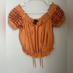 Cropped over the shoulder embroidered shirt